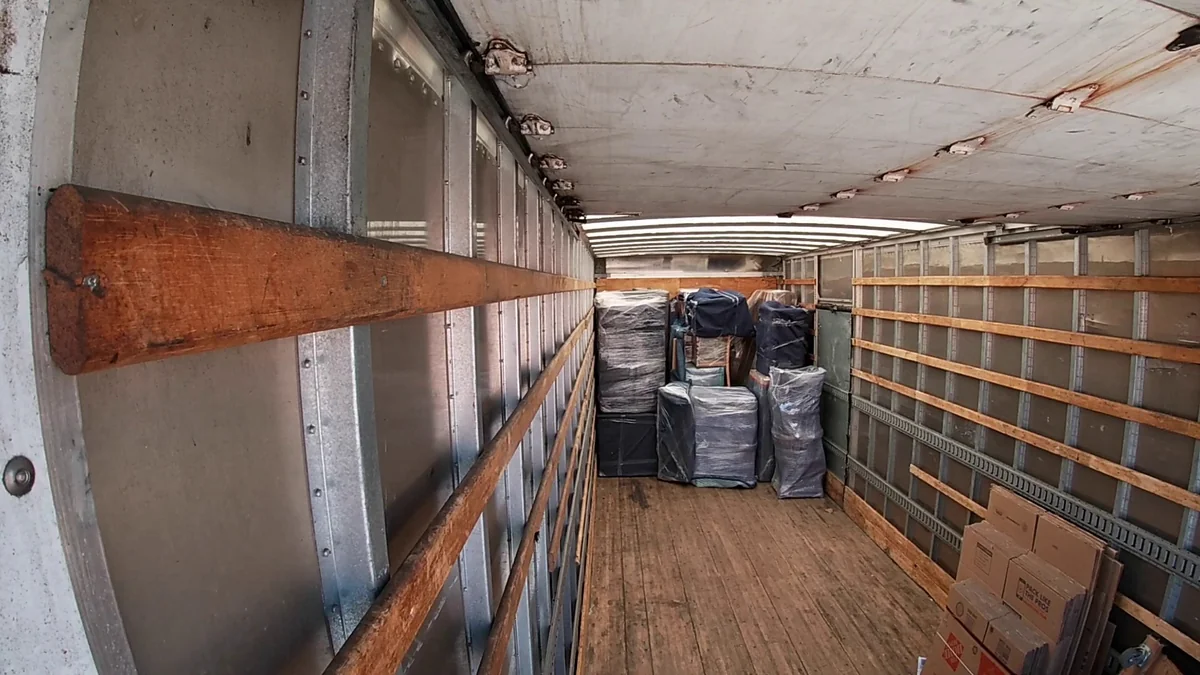 Lionheart moving truck loaded with furniture in Bossier City